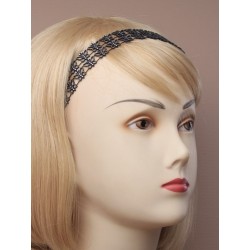 black stretch elastic bandeaux with open silv design. in...