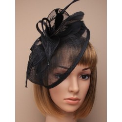 large black looped hessian hatinator on a narrow aliceband.