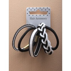 card of 5 black and white monochrome elastics with ferrule.