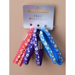 Hair Elastics - A set of 6 daisy print coloured elastics.