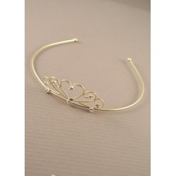 Tiara - 12cm Gilt metal tiara with small clear stones.