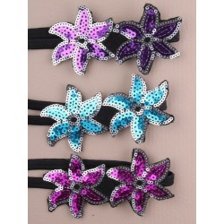 black stretch elastic headband with 2 sequin daisy motif....