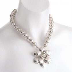 Necklace - Worn silver colour metal bead flower design...