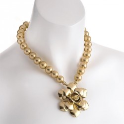 Necklace - Worn gold colour metal bead flower design...